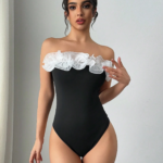Female elegant simple date party holiday exaggerated three-dimensional flounder black and white tight bodice with breast One-pie
