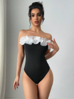 Female elegant simple date party holiday exaggerated three-dimensional flounder black and white tight bodice with breast One-pie